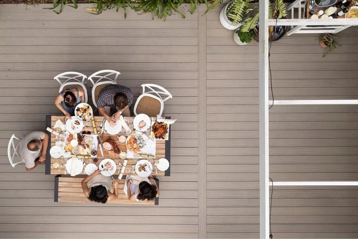 family having lunch on the deck